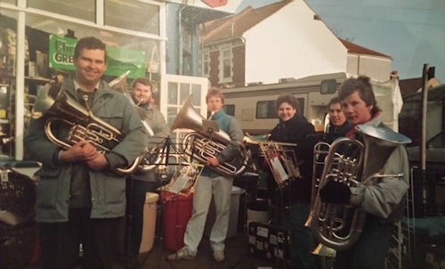 Carolling outside Woods Hardware shop in Tangier Road